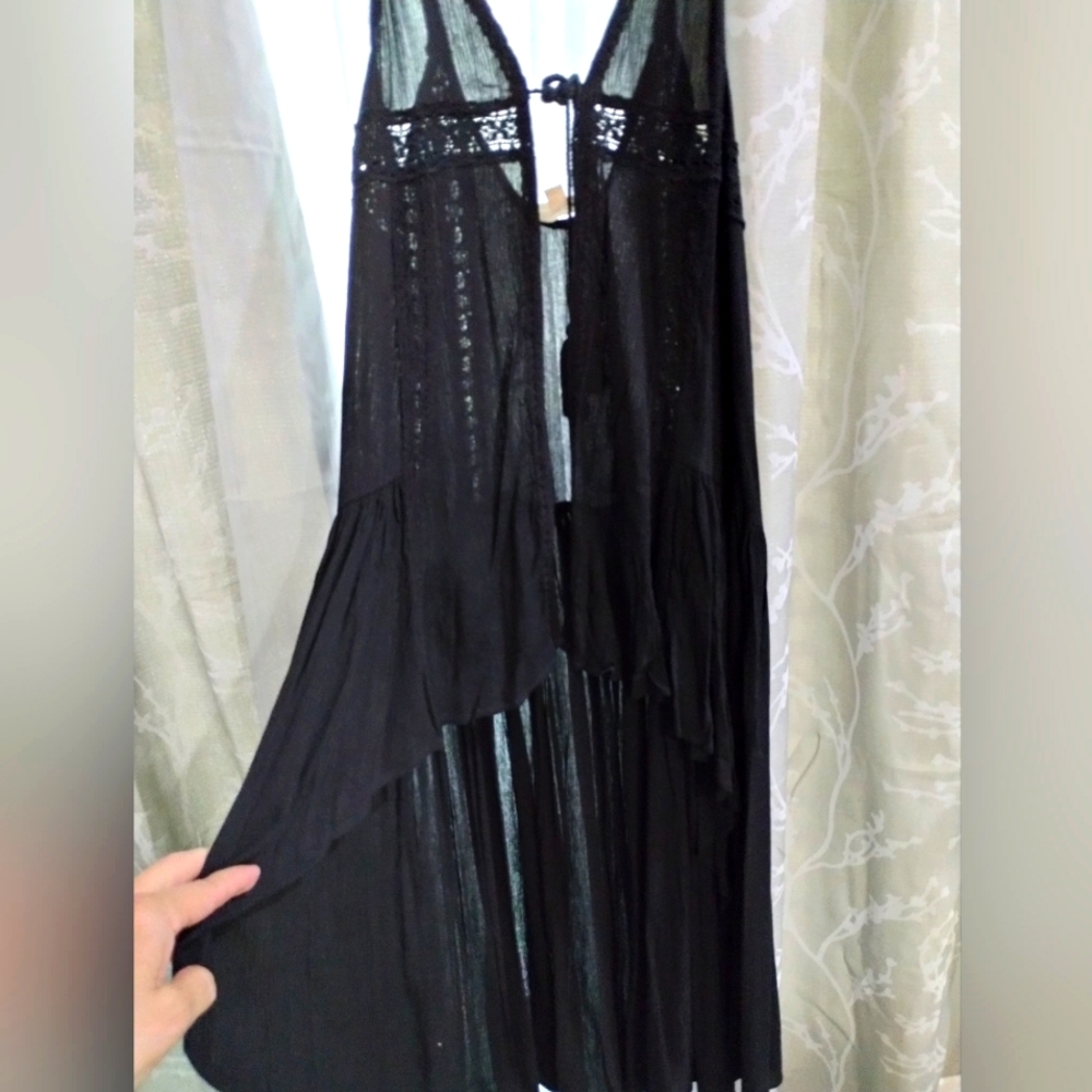 Very cute you can wear over anything Sale can't go down anymore sorry guys